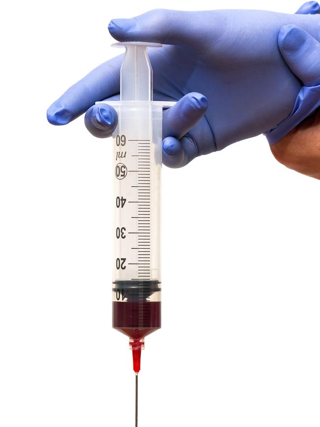 Blood. Syringe with blood - Stock Image. Picture taken from iStock. Blood , bank , transfusion , needle .  To with Insight piece for Bill Rule.