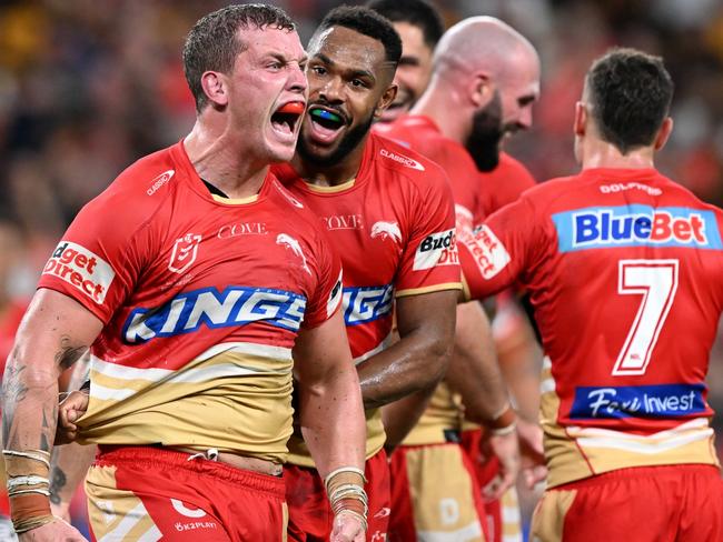 BRISBANE, AUSTRALIA - MARCH 24: Jarrod Wallace of the Dolphins celebrates scoring a try during the round four NRL match between the Dolphins and Brisbane Broncos at Suncorp Stadium on March 24, 2023 in Brisbane, Australia. (Photo by Bradley Kanaris/Getty Images)