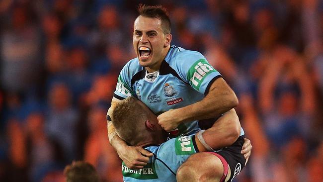 NSW's Josh Reynolds celebrates victory for the Blues with Luke Lewis during Game 2 of State of Origin series NSW Blues v Queensland Maroons at ANZ Stadium, Sydney. pic. Phil Hillyard