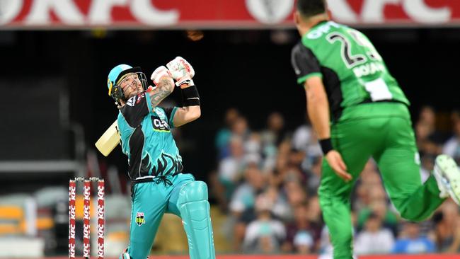 Brendon McCullum smashes a six off Scott Boland.