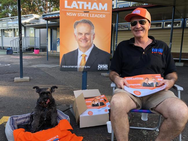 NSW One Nation volunteer John Pearce, had his mini schnauzer Satchmo for company at Narraweena Public School.