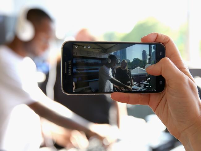 Cool cachet ... DJs spin at a Samsung event during Lollapalooza in Chicago, earlier this month. Picture:. Tasos Katopodis/Getty Images for Samsung