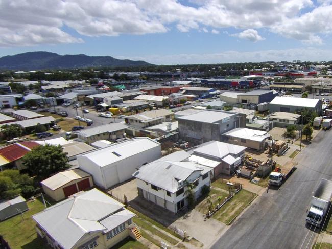 A BUNGALOW property going to auction on Friday combines living with work. The four bedroom home includes a large workshop at 18 Barry St, Bungalow.