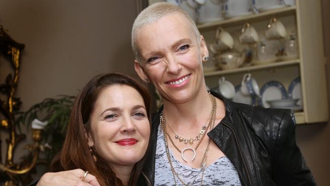 Actresses Drew Barrymore and Toni Collette pose for photographers during a photo call for the film Miss You Already, in London, Thursday, Oct. 9, 2014. (Photo by Joel Ryan/Invision/AP)