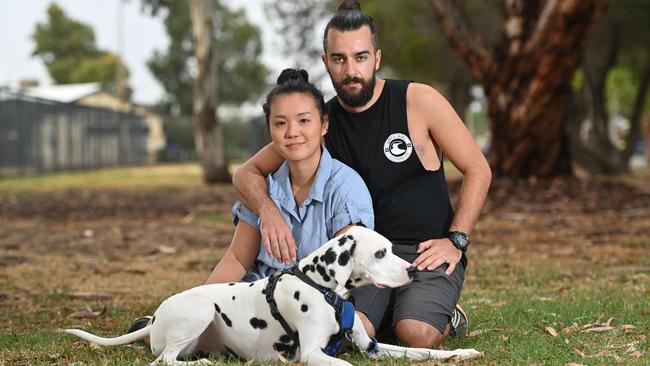 Nicky Wong and partner Jose Merlos, pictured with dog Loki, spent two days stranded in the state's Far North. Picture: Keryn Stevens