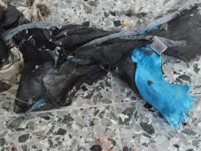 The remains of a blue Karrimor backpack which contained the device. Picture: New York Times/AFP