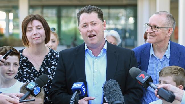 Health Minister Jack Snelling, with his family and Premier Jay Weatherill, announces his retirement from politics. Picture: Tom Huntley