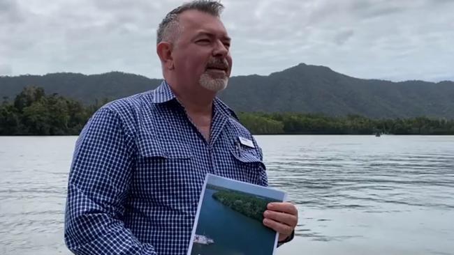 Douglas Shire Mayor Michael Kerr holds a Daintree River crossing options report.