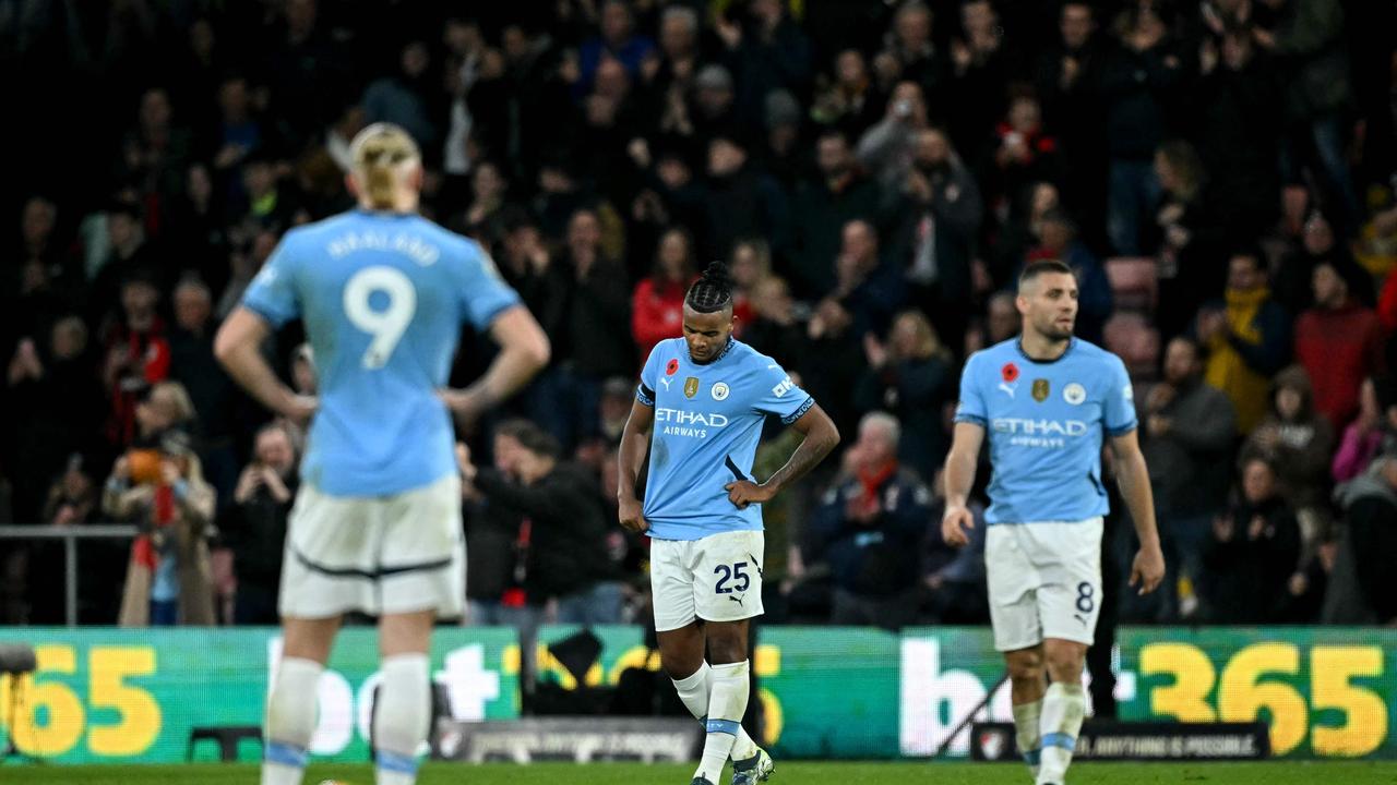 Manchester City's Swiss defender #25 Manuel Akanji reacts after Bournemouth's Brazilian striker #09 Evanilson (not pictured) scores the team's second goal during the English Premier League football match between Bournemouth and Manchester City at the Vitality Stadium in Bournemouth, southern England on November 2, 2024. (Photo by JUSTIN TALLIS / AFP) / RESTRICTED TO EDITORIAL USE. No use with unauthorized audio, video, data, fixture lists, club/league logos or 'live' services. Online in-match use limited to 120 images. An additional 40 images may be used in extra time. No video emulation. Social media in-match use limited to 120 images. An additional 40 images may be used in extra time. No use in betting publications, games or single club/league/player publications. /