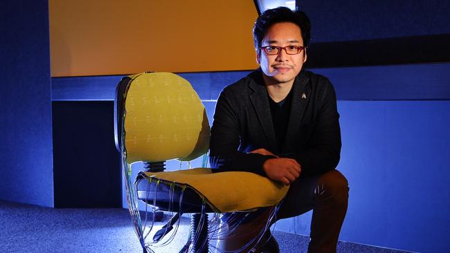 Dr Stephen Wang with his patented prototype for the ultimate smart chair, which sends you text message or emails when your posture is slumping or your're sitting in ways back for your back at Monash University on Monday, June 1, 2015, in Clayton, Australia. Picture: Hamish Blair