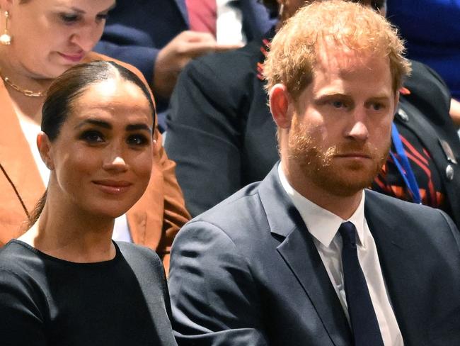 (FILES) Prince Harry (R) and Meghan Markle (L), the Duke and Duchess of Sussex, attend the 2020 UN Nelson Mandela Prize award ceremony at the United Nations in New York on July 18, 2022. A multi-million-dollar deal between a media group run by Britain's Prince Harry and his wife Meghan Markle, and streaming giant Spotify is to end, a report said June 15, 2023. (Photo by TIMOTHY A. CLARY / AFP)