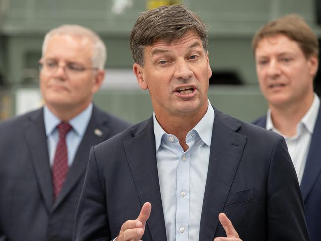 Angus Taylor (c) with Scott Morrison at Ferra Engineering, a defence manufacturing business in the electorate of Bonner. Picture: Jason Edwards