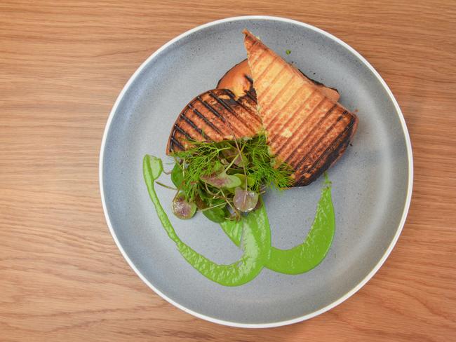 Locally sourced toasted blue swimmer crab sandwich with fennel and woodland sorrel salad. Photo: AAP Image/ Brenton Edwards