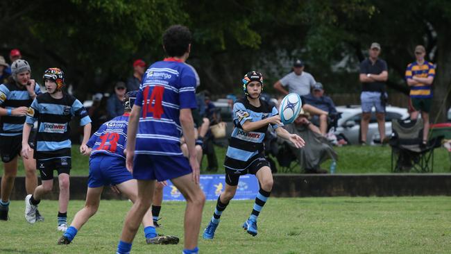 Day 1 of the King of the Country junior rugby union tournament at the Gold Coast Eagles Rugby Union Club.Maroochydore Swans (BLUE AND BLACK) vs USQ Saints (Blue ) Maroochydore Player No10 Luke Sparke USQ Player No Pic Mike Batterham