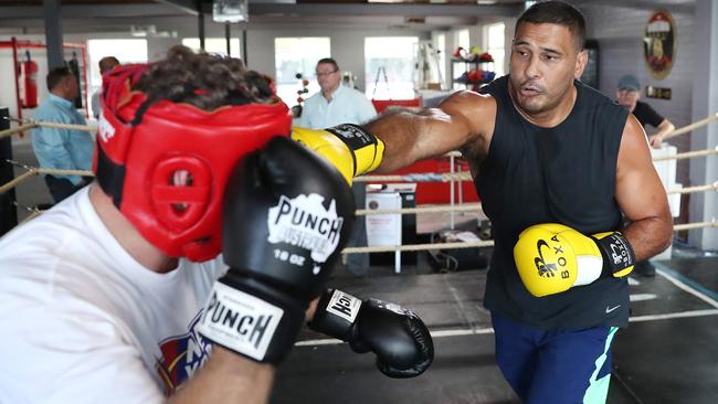 Justin Hodges puts the finishing touches on his fight preparation.