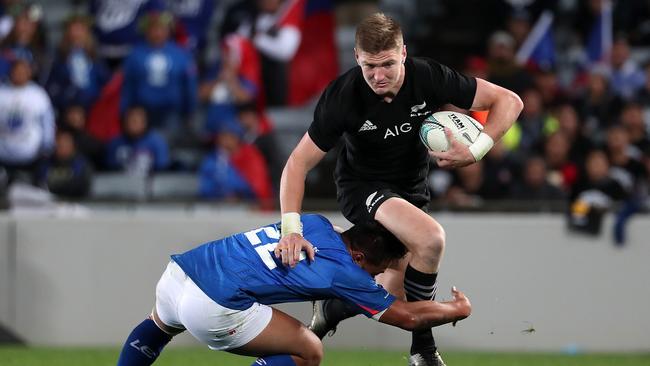 Jordie Barrett of the All Blacks is tackled by D'Angelo Leuila of Samoa at Eden Park.