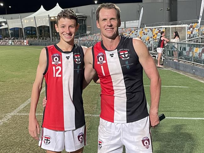 Pictured: Saints father-son duo Cooper Glass and Wes Glass (l-r). Cooper Glass making his senior debut for Saints in the Battle of Manunda clash against Hawks on Anzac Day 2024. Legacy Round AFL Cairns. Photo: Gyan-Reece Rocha