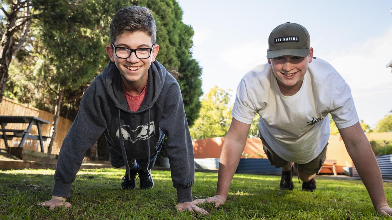 Toowoomba Flexi School students Jackson Tipple (left) and Brodie Butlin are ready for the National Push-Up Challenge at the Toowoomba launch to fundraise for Lifeline Darling Downs and South West Queensland. Picture: Kevin Farmer