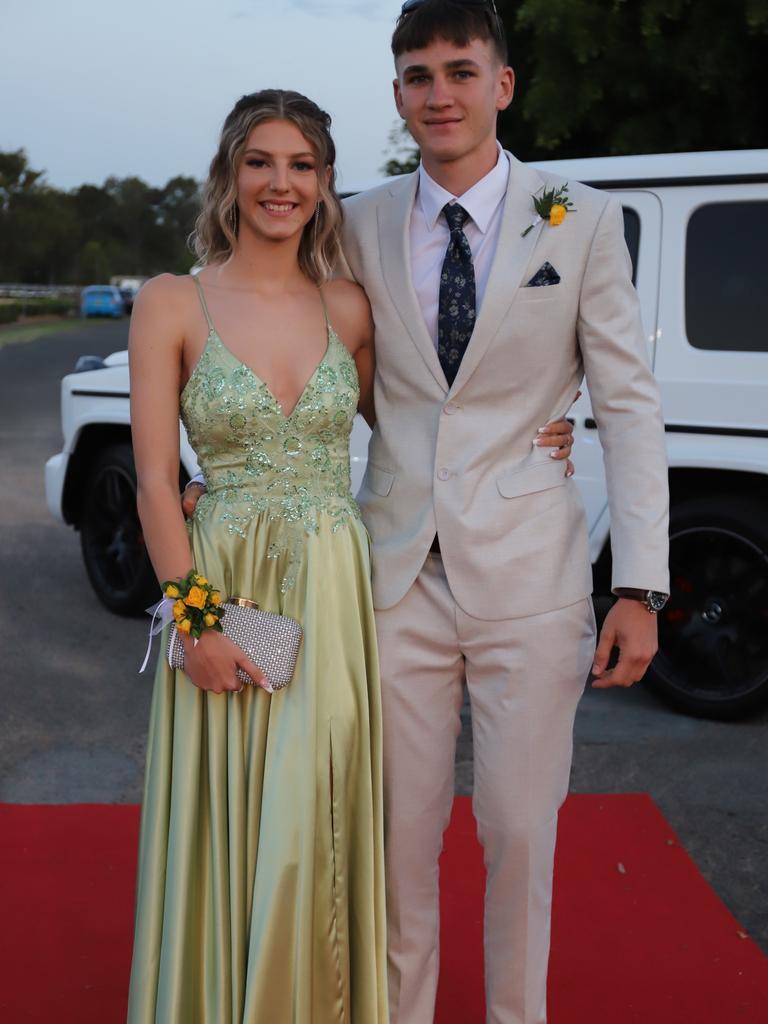 Carly Cockburn and partner at the James Nash State High School formal 2022.