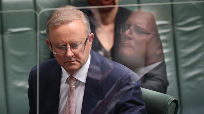 Anthony Albanese with a reflection of Scott Morrison in the screen, during Question Time in the House of Representatives in Parliament House. Picture: NCA NewsWire / Gary Ramage