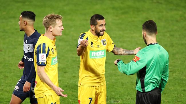 Milan Duric and Matt Simon react to a referee decision during Monday night’s surprise victory. Picture: Getty