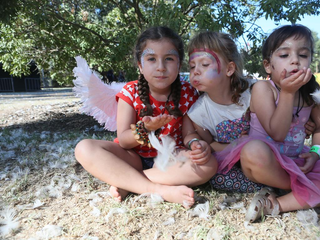 Ayana, 5, Rosie, 5, and Cali, 3, at WOMADelaide 2018. Picture: AAP/Emma Brasier