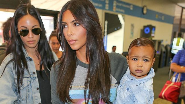 Kim Kardashian and North West arrive at Burbank Airport to catch a flight out of town.