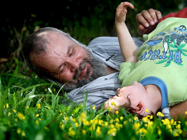 Member of the stolen generation Mark Beach, with his son Zaydan Cummings-Beach.