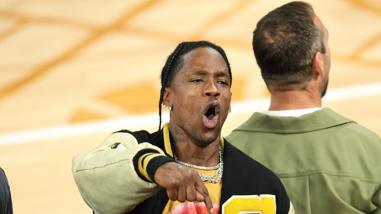 PARIS, FRANCE – AUGUST 08: American rapper and singer Travis Scott attends a Men's basketball semi-finals match between Team United States and Team Serbia on day thirteen of the Olympic Games Paris 2024 at Bercy Arena on August 08, 2024 in Paris, France. (Photo by Arturo Holmes/Getty Images)