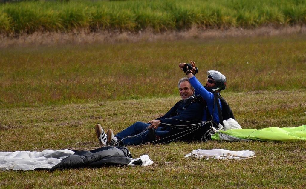 Bob Sherwell, who is about to turn 87, shares his second charity skydive with Pastor Joel Baker, of Flametree Baptist Church.