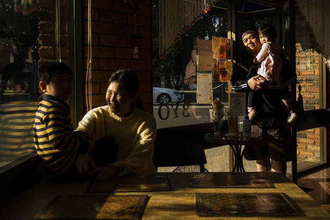 Pim (L) 40, and Dome (R) 42, Henchaichone, owners and chefs of Na SiamThai Restaurant in Narooma, NSW, with their children Lipo, 4 (L) and Lisha, 2 (R). Pim and Dome have owned the restaurant for 6 years and are grateful to Narooma locals who have supported them through the summer bushfires and the more recent period of COVID-19 social distancing restrictions. Picture by Sean Davey.