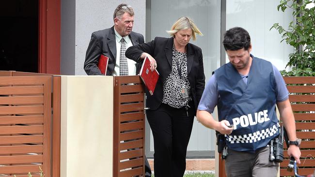 Detectives outside the house where the shots were fired in St Clair Ave, St Clair. Picture: Roger Wyman