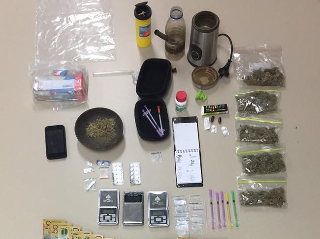 Weapon, drugs, cash seized in Whitsunday police operation