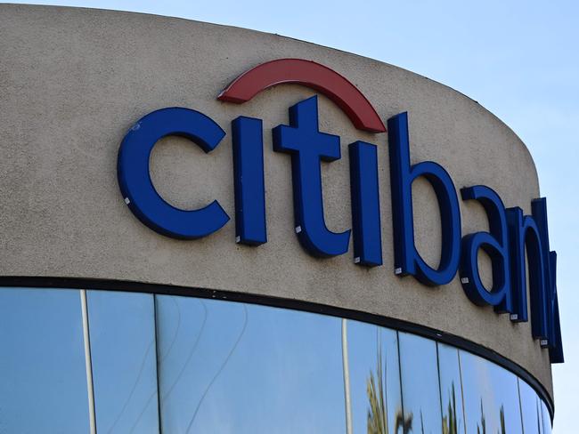 (FILES) Signage is displayed outside of a Citigroup Citibank branch in Torrance, California, on March 13, 2023. JPMorgan Chase and Citigroup reported increased second-quarter profits on July 12, 2024, despite somewhat higher costs to account for bad loans in light of greater stress on lower-income customers. At Citi, second-quarter profits were $3.2 billion, up 10 percent from the year-ago period, reflecting the benefit of a six percent drop in operating expenses following a reorganization directed by CEO Jane Fraser. (Photo by Patrick T. Fallon / AFP)