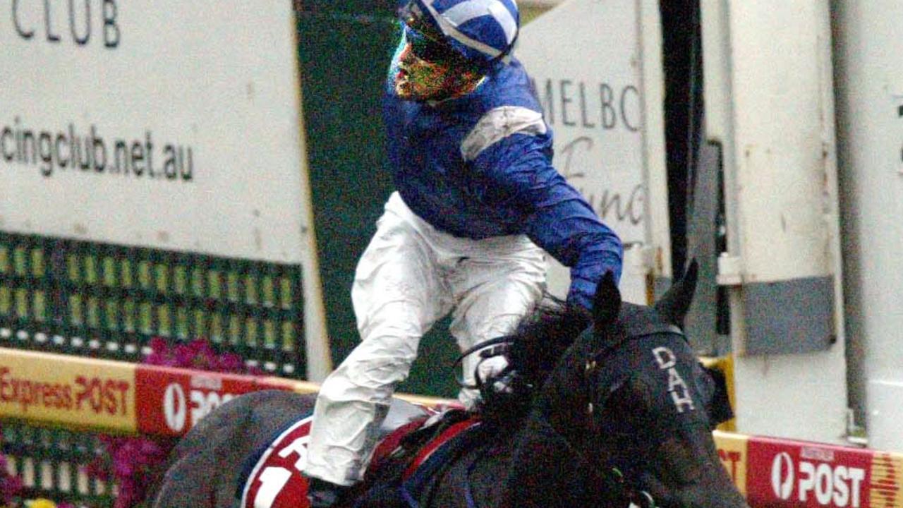 25 Feb 2006 - Caulfield Races - race 6 Blue Diamond Stakes - Nadeem ridden by jockey Dwayne Dunn shows his ellation at winning. sport horseracing action