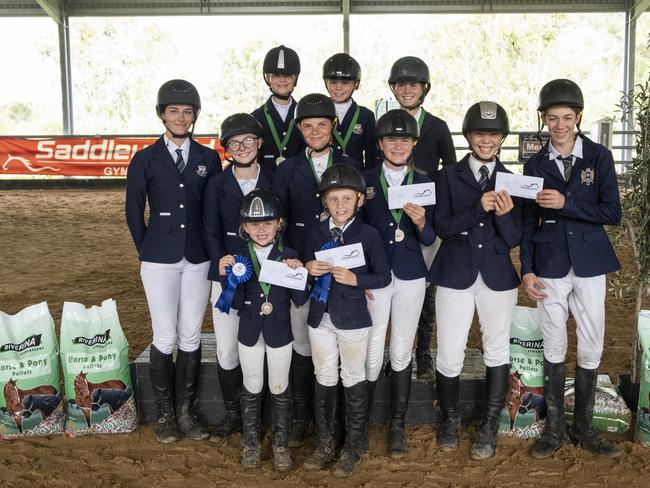 Victory College Interschool Show Jumping Competition's victorious primary and secondary teams (back, from left) Charlie Neil, Emily Davis, Olivia Hewitt-Toms, (middle row) Alyx Peters, Marnie Turner, Makayla Godwin, Saachi Stiefler, Madilyn Jessup-Little, Callum Lehman and (front row) Arianah Bazzan and Jameson Bazzan.