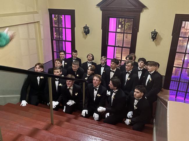 The young men at the St Mary's Debutante Ball getting ready to accompany the young ladies.