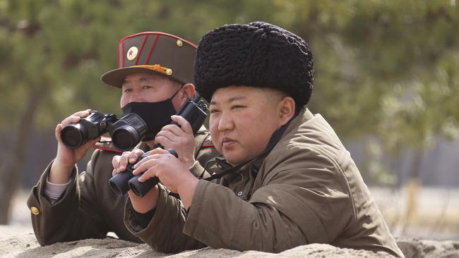 Kim Jong-un inspects the drill on Monday. He ‘highly appreciates the perfect combat readiness’ of his forces. Picture: Korean Central News Agency via AP