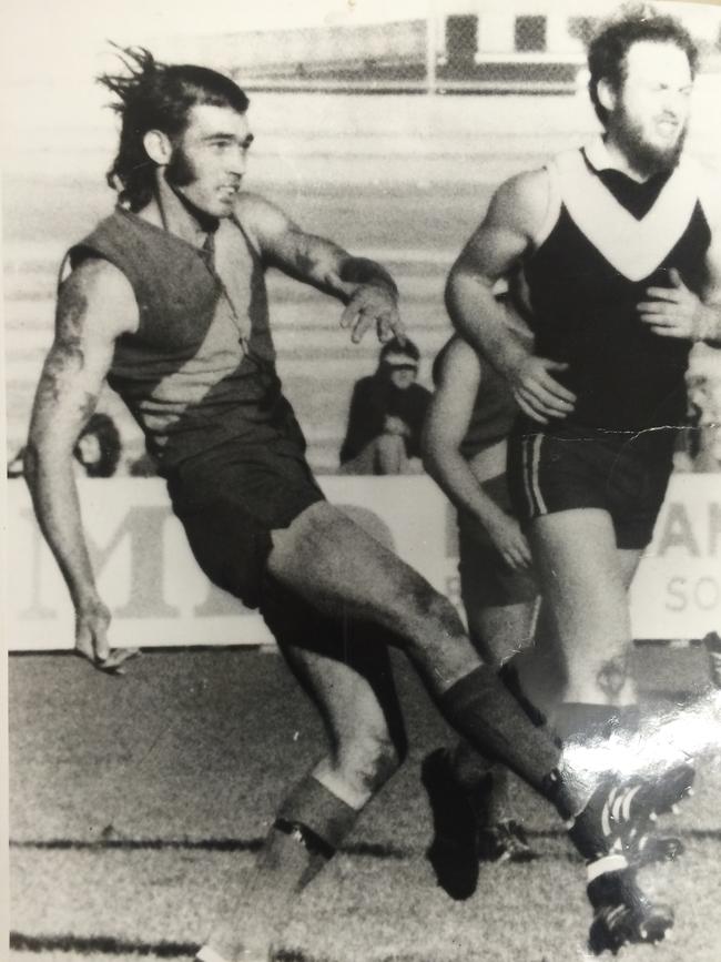 North Shore champion centre half-back John Albon, left.