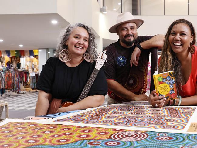 The Cairns Indigenous Business Expo will return to The Pier Shopping Centre for a third consecutive year, with this year's expo featuring interstate exhibitors for the first time. Merindi Schrieber from the Briscoe Sisters, event organiser Marc Harbrow and Bush Tukka woman Samantha Martin admire the artwork of Lorna Jackson, a Northern Territory desert artist who will be selling her work at this year's Cairns Indigenous Business Expo. Picture: Brendan Radke