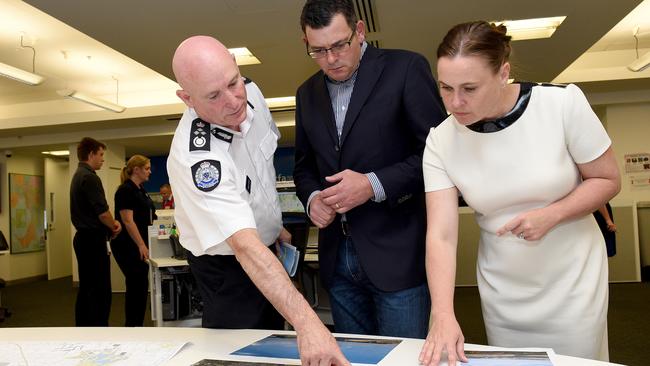 Premier Daniel Andrews and Emergency Management Commissioner Craig Lapsley (left) with former Emergency Services Minister Jane Garrett at the State Control Centre. Picture: Mike Keating