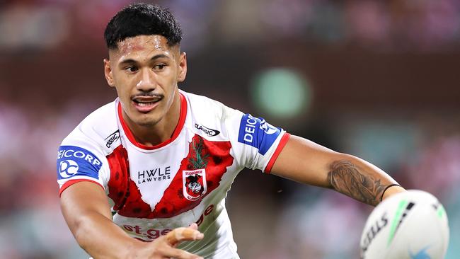 SYDNEY, AUSTRALIA - APRIL 25:  Talatau Amone of the Dragons passes during the round seven NRL match between the St George Illawarra Dragons and the Sydney Roosters at Sydney Cricket Ground, on April 25, 2022, in Sydney, Australia. (Photo by Mark Kolbe/Getty Images)