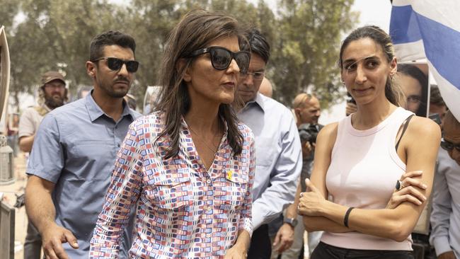 Nikki Haley tours the site of the Nova music festival in Israel with Tali Biner, who was there when Hamas attacked on October 7. Picture: Getty Images