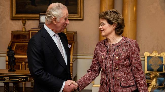 Britain's King Charles III shakes hands with the Governor of South Australia, Frances Adamson. (Photo by Aaron Chown / POOL / AFP)