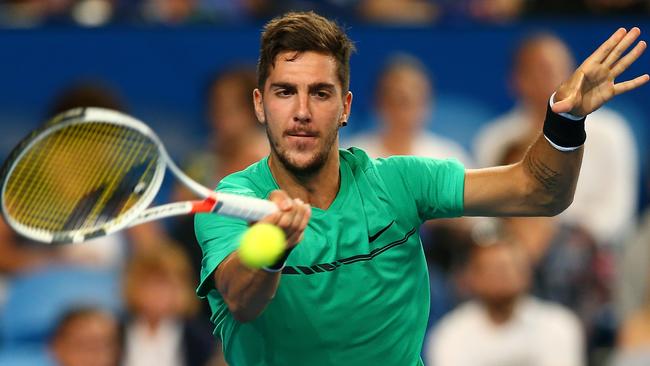 Thanasi Kokkinakis in action at the Hopman Cup at Perth Arena this week. He has revealed he almost considered retirement after a shoulder injury. Picture: Paul Kane/Getty Images