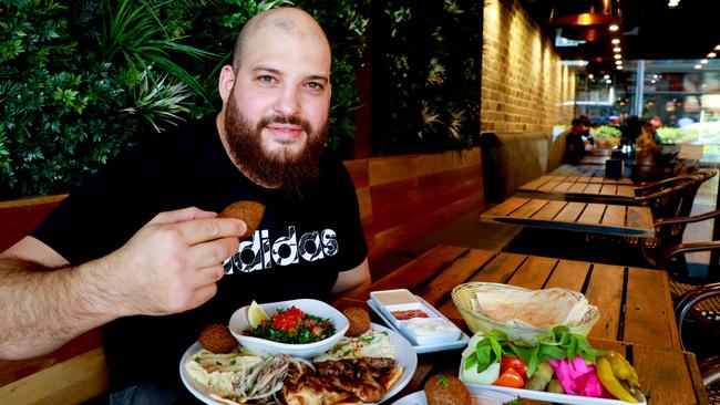 Jasmins Granville owner Abraham Ghazal with some enticing Lebanese food. Picture: Angelo Velardo