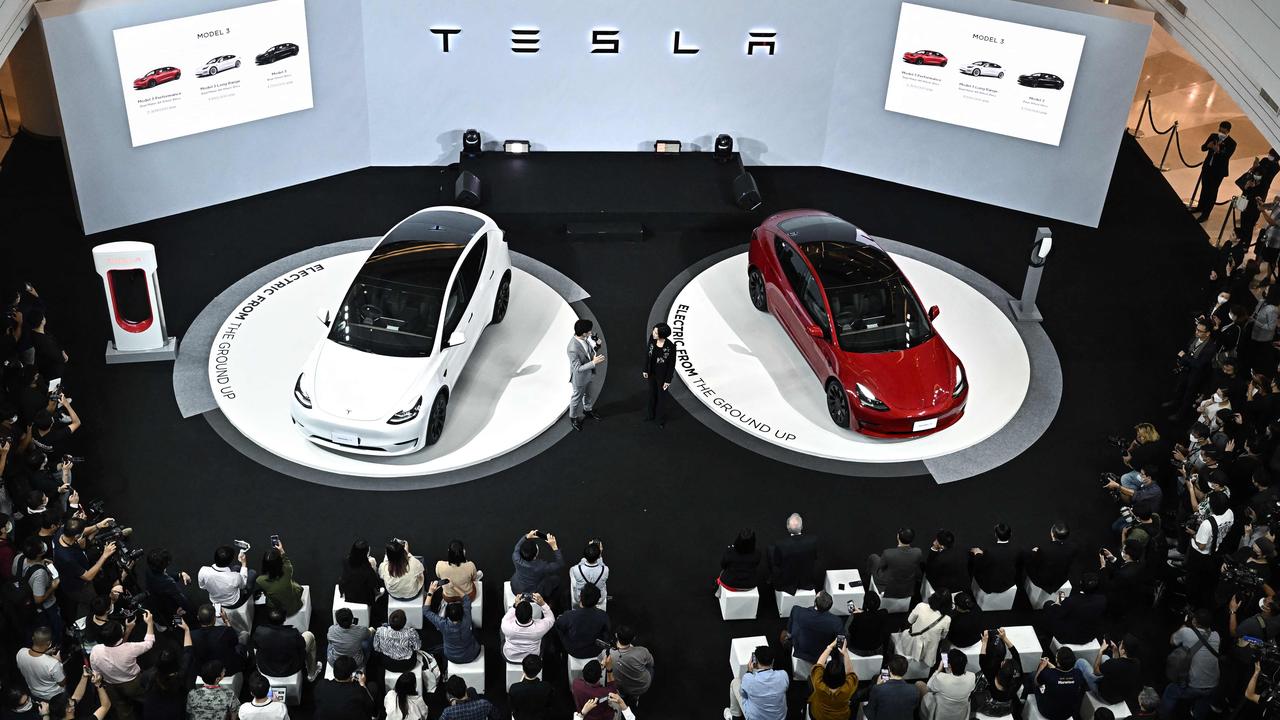 Australian examples of the Tesla Model Y and Model 3 are made in China. Photo: Lillian Suwanrumpha / AFP