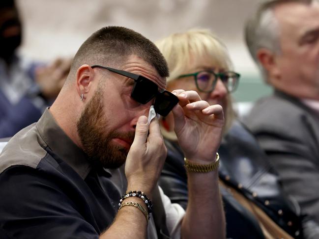 PHILADELPHIA, PENNSYLVANIA - MARCH 04: Travis Kelce #87 of the Kansas City Chiefs reacts during his brother, Jason's, retirement from the NFL at NovaCare Complex on March 04, 2024 in Philadelphia, Pennsylvania. (Photo by Tim Nwachukwu/Getty Images)