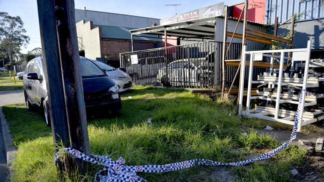 Police at the scene A-Team mechanics garage in Condell Park after the fatal shooting of Charbaji. Photo Jeremy Piper