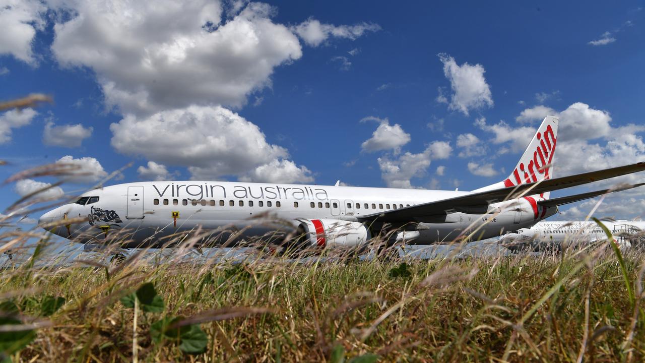 Grounded Virgin aircraft parked at Brisbane Airport. Picture: Darren England/AAP